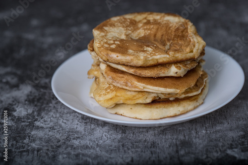 Pancakes on white plate