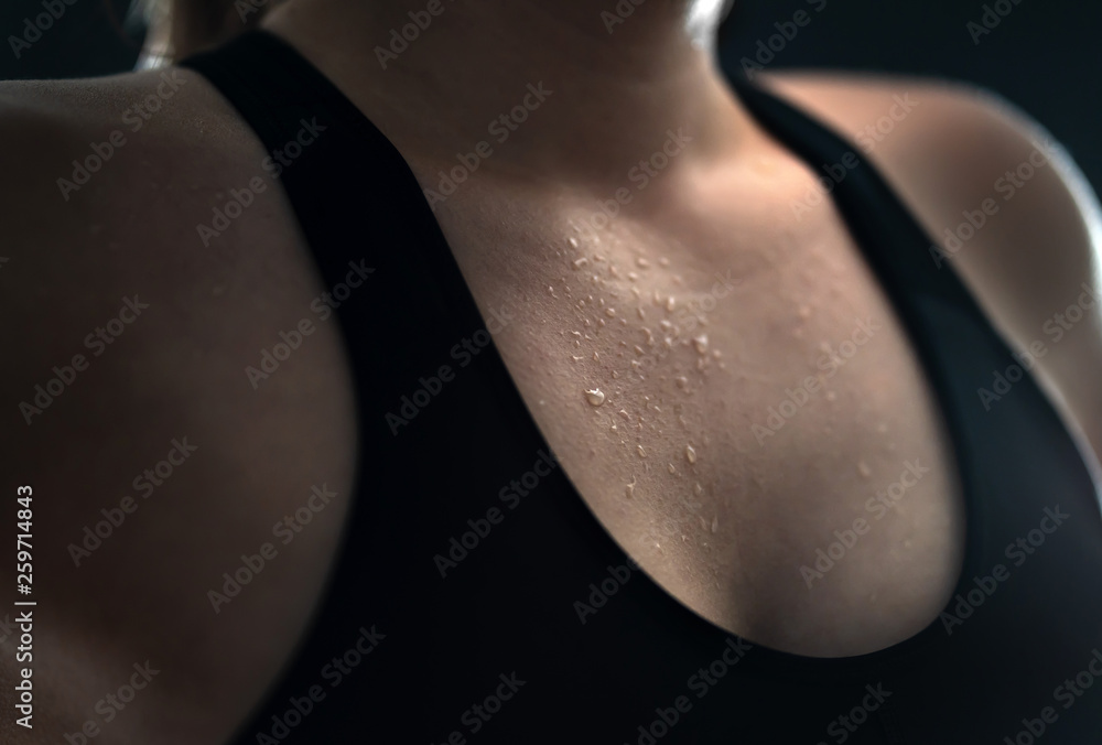 Sweat on skin. Sweaty woman after gym workout, heavy cardio or fat burning  training. Yoga instructor