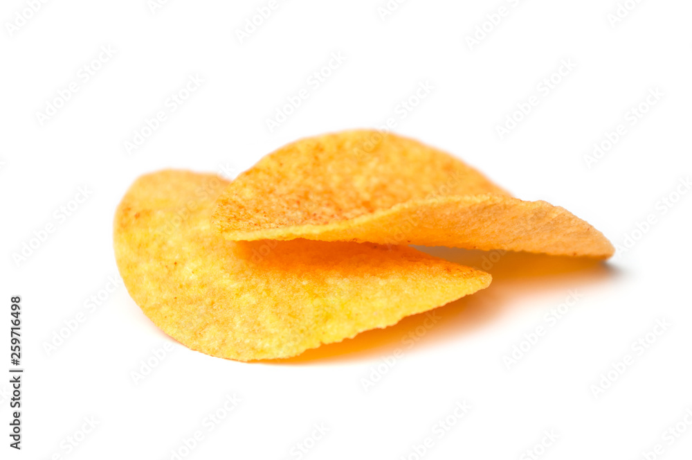 closeup of paprika chips on white background closeup of paprika chips on white background