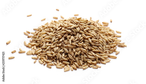 Peeled oat grains isolated on white background