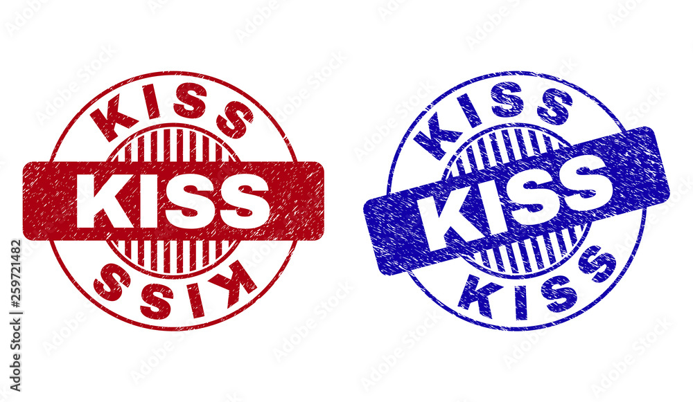 Grunge KISS round stamp seals isolated on a white background. Round seals with grunge texture in red and blue colors. Vector rubber watermark of KISS label inside circle form with stripes.