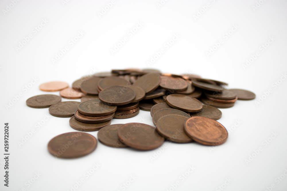 Bronze coins on white background. Coins of five euro cents. Savings. Bronze coins on white background. Coins of five euro cents. Savings.