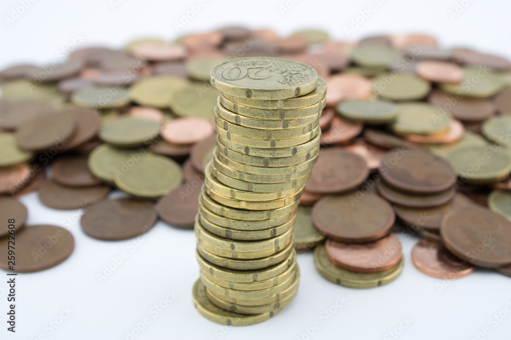 Stack twenty euro cent coins on more coins of little value. Savings of coins Stack twenty euro cent coins on more coins of little value. Savings of coins