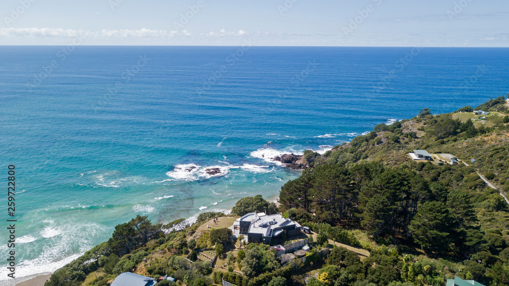 aerial shot of Awana Beach in Great Barrier Island, New Zealand