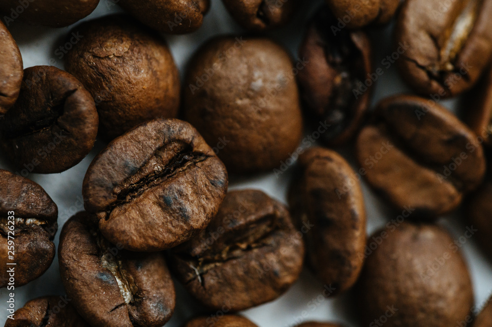 coffee beans on wooden background coffee beans on wooden background
