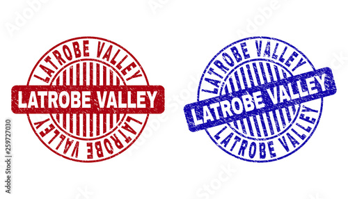 Grunge LATROBE VALLEY round stamp seals isolated on a white background. Round seals with grunge texture in red and blue colors. photo