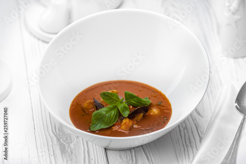 Tomato dipping sauce with vegetables in a bowl