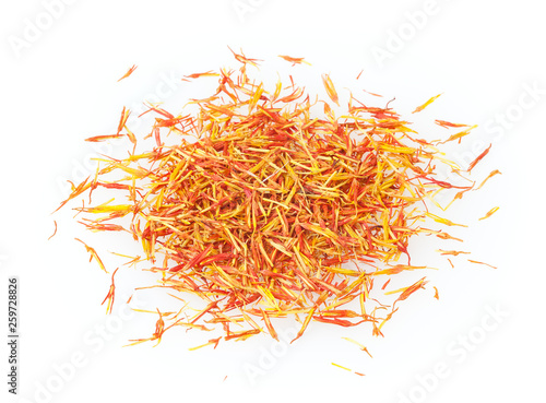 Heap of dried saffron isolated on white background