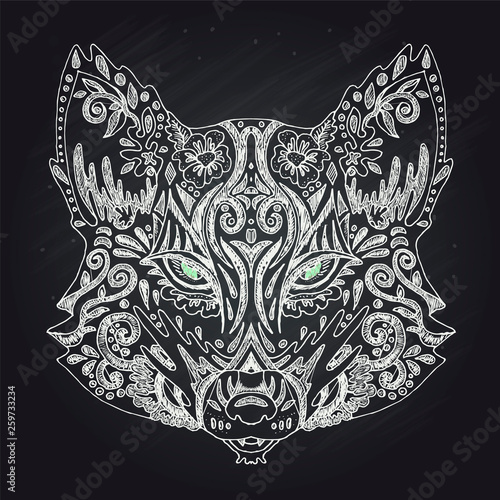 Wild beautiful fox head hand drawn in chalk on a black background. Color book. Fashion in a vector illustration photo