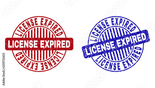 Grunge LICENSE EXPIRED round watermarks isolated on a white background. Round seals with grunge texture in red and blue colors.