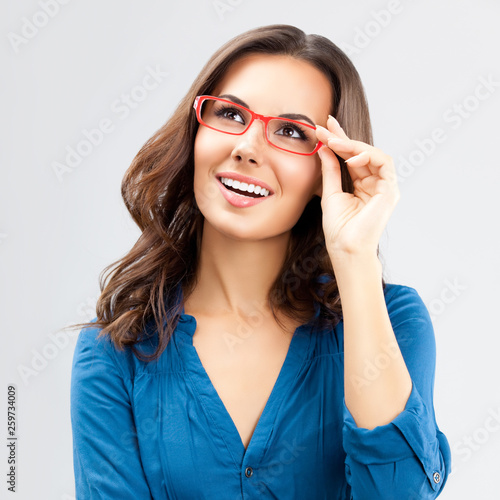 Portrait of happy businesswoman in glasses © vgstudio
