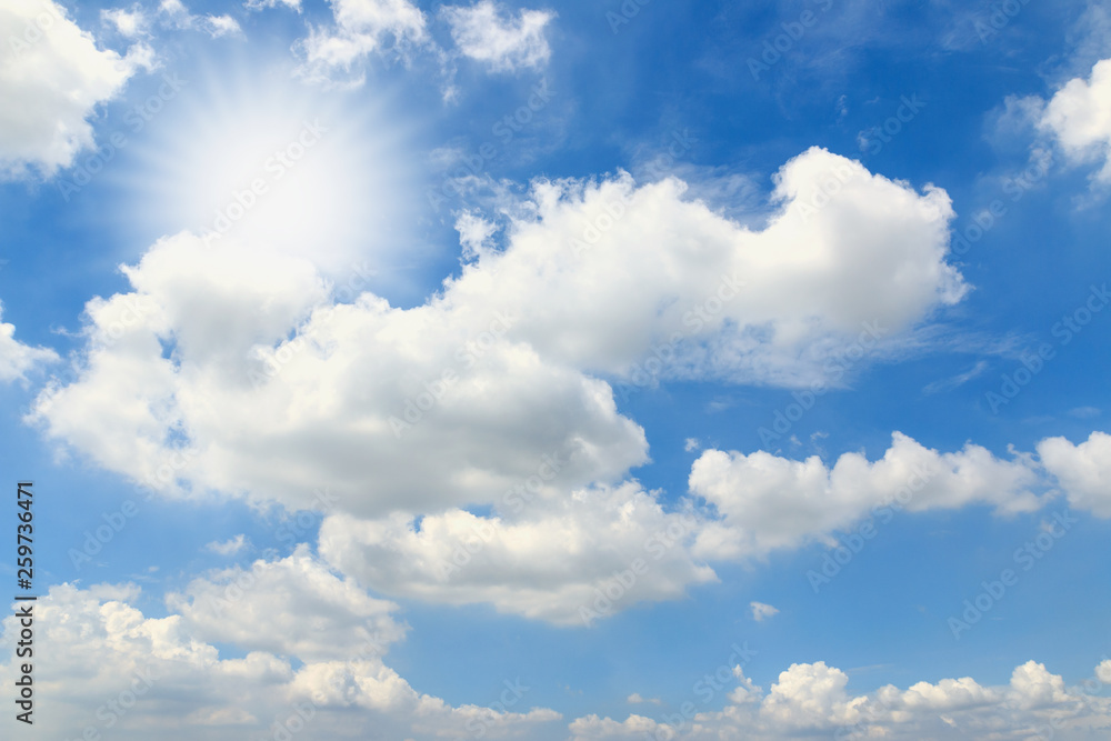 Fototapeta premium Beautiful blue sky with white fluffy clouds ,the sunlight