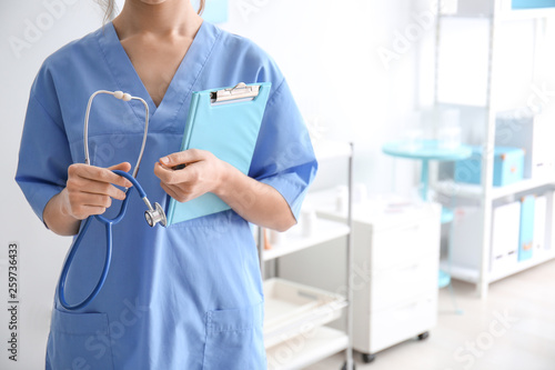 Female doctor working in cl...