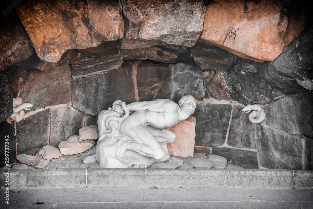 Fototapeta premium SWEDEN, Stockholm City Hall, The Punishment of Loki - Statue of Loki With Snakes