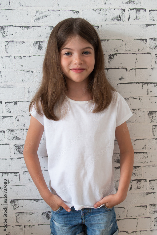 t-shirt design concept - smiling happy young girl in white blank t shirt
