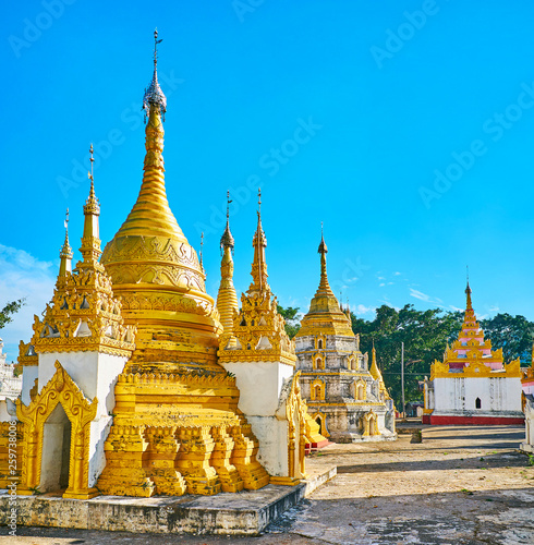 Among ornate stupas of Nget Pyaw Taw Paya, Pindaya, Myanmar photo