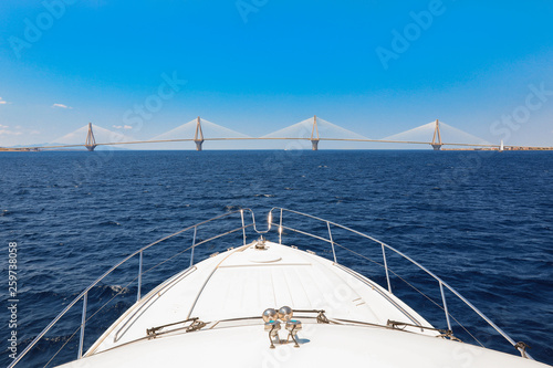 The Rio Antirrio Bridge or Charilaos Trikoupis Bridge, photo taken from the boat during summer holidays 2018. photo