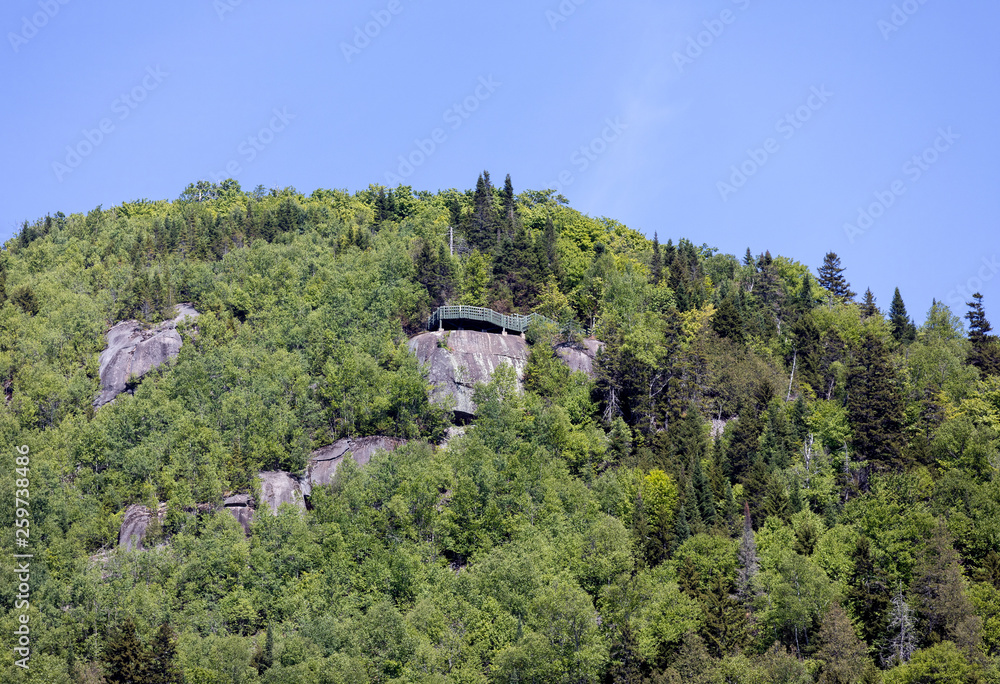 View of La Roche observation point and summer green foliage colors of Mont Tremblant National Park, Quebec, Canada