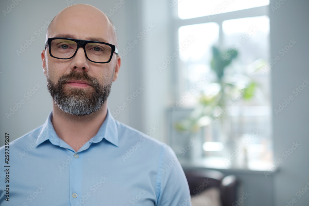 Bearded middle-aged man wearing glasses. Bearded middle-aged man wearing glasses.