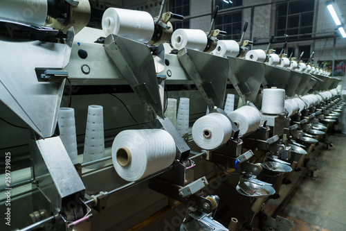 old knitted fabric. Textile factory in spinning production line and a rotating machinery and equipment production company