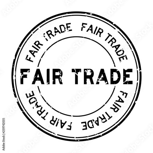 Grunge black fair trade word round rubber seal stamp on white background