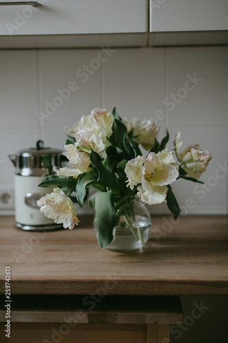 Yellow papagei tulip bouquet in the kitchen, lifestyle picture, Springtime