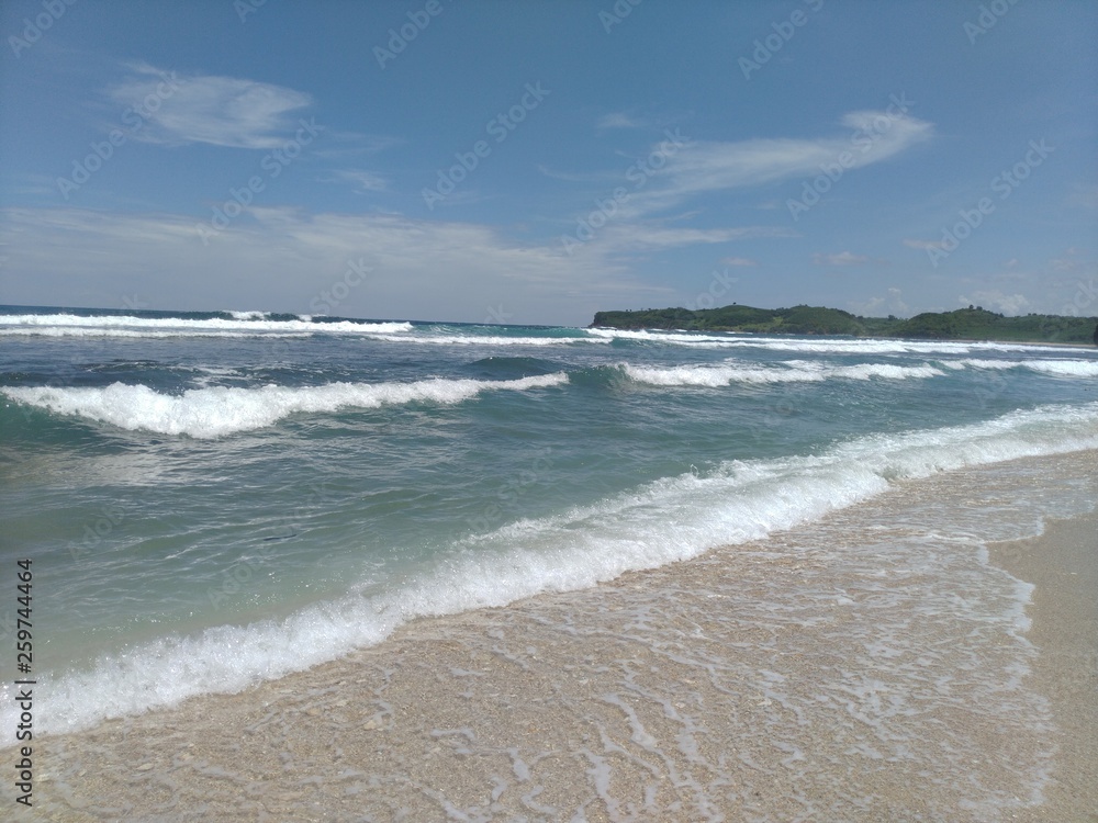 sunny sea and beach photos during the day.