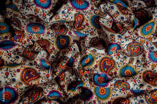 Indian colorful fabric with red  blue and green colors.