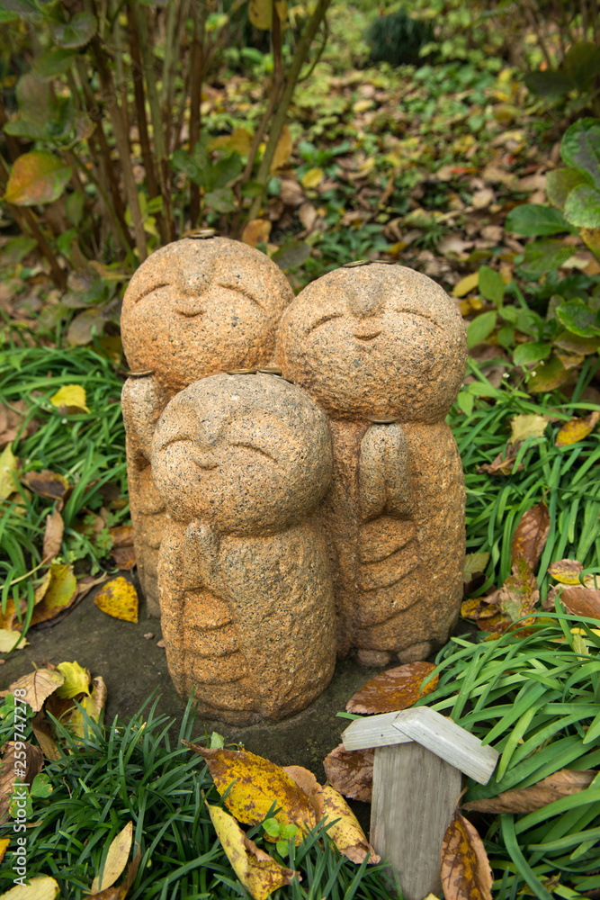 Small buddha in a garden, Japan Small buddha in a garden, Japan