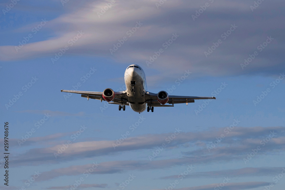 Flying passenger Airplane preparing to land Flying passenger Airplane preparing to land