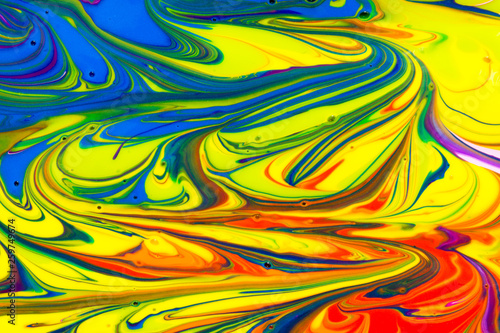 Abstract seamless background of multicolored paint swirls