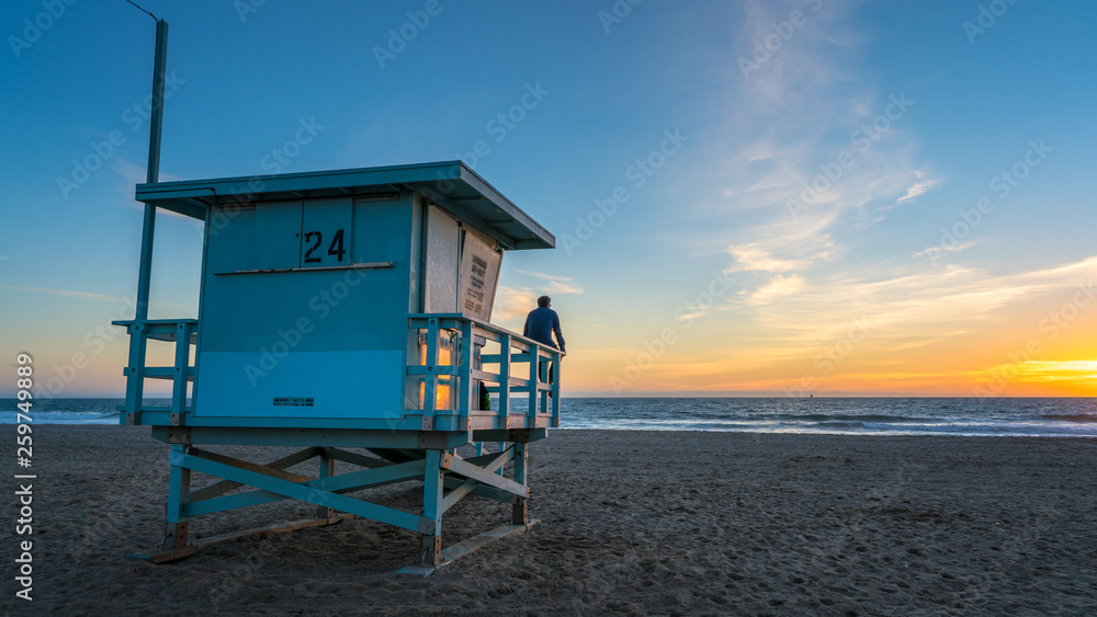 Life guard tower over sunset in Venice beach Los Angeles, California