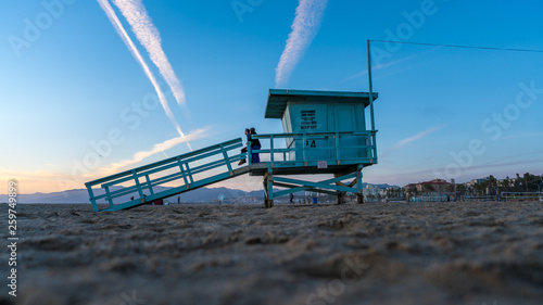 Life guard tower over sunset in Venice beach Los Angeles, California