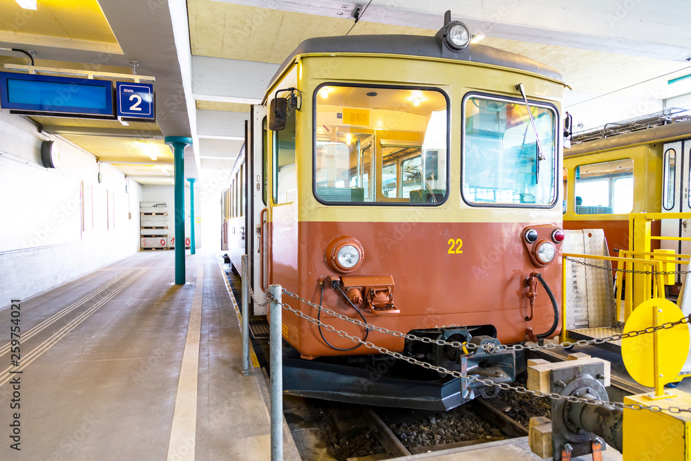 Traditional train in Mürren mountain railway station , Berne Switzerland