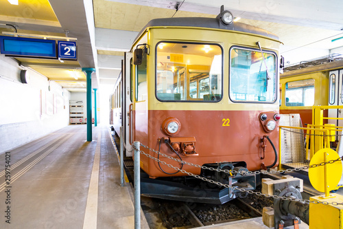 Traditional train in Mürren mountain railway station , Berne Switzerland