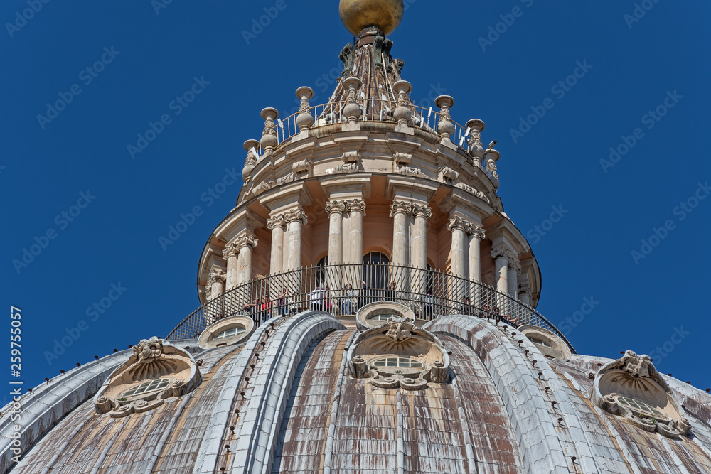 ROME, ITALY - march, 2019: Close up of the Dome (cupola) of The Papal Basilica of St. Peter (San Pietro) in Vatican City Rome, designed by Michelangelo . It is the tallest dome in the world.