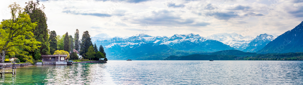 Panorama view in lake Thun and view of Bernese Alps mountain Berne, Switzerland