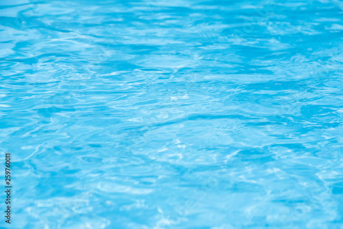 Blue swimming pool rippled water detail © treerasak