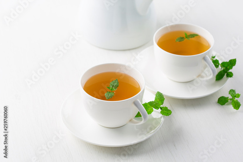 cup of herbal tea, white background