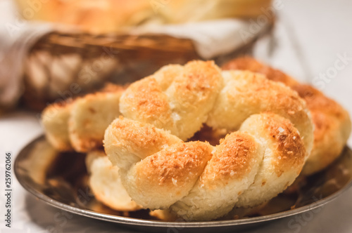 Closeup detail of a tasty sweet curly bread © GuRezende