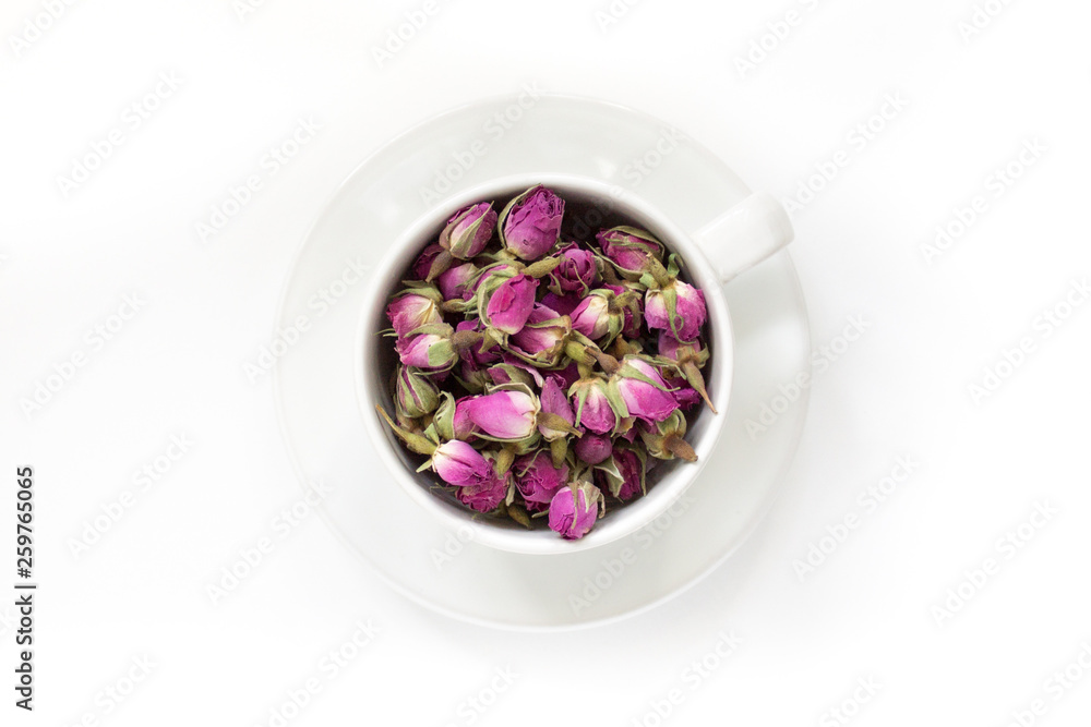 Cup of roses tea with rose