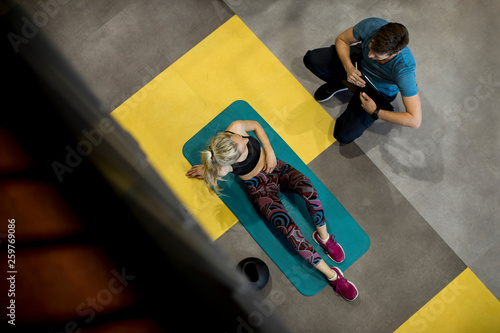 Top view at sporty woman ex...