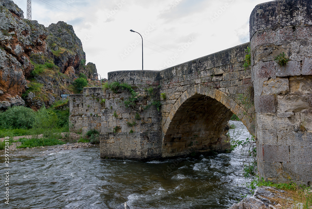 Spain Rio Pisuerga by stone bridge of Cervera de Pisuerga. Palencia