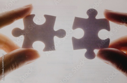2 puzzles in the hands