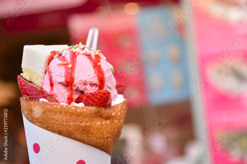 Japanese Crepe with strawberry ice cream and cheese cake at Harajuku. photo