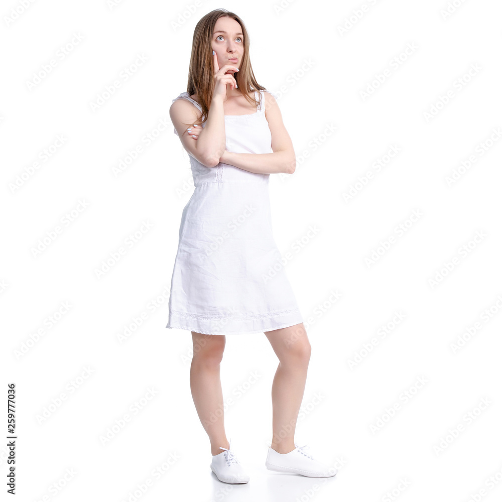 Woman in white dress standing thinking on white background isolation Woman in white dress standing thinking on white background isolation