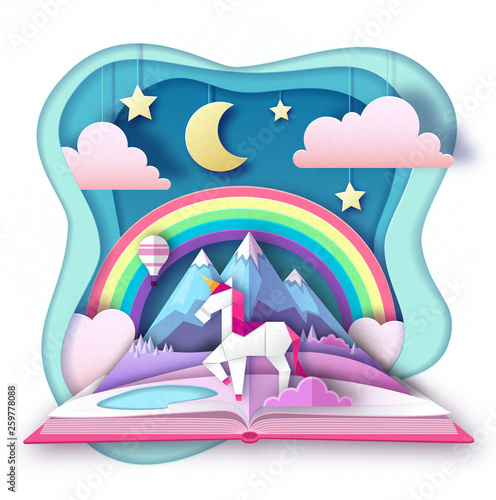 Open fairy tale book with unicorn and mountain landscape. Cut out paper art style design