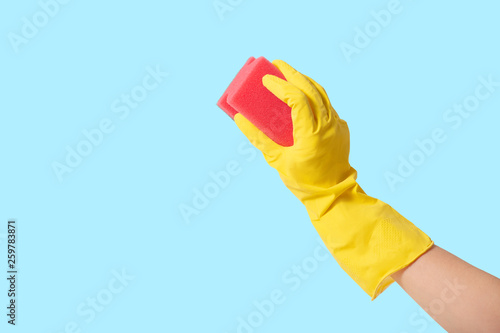 cleaner Hand in protective gloves wash the surface, isolated on color background