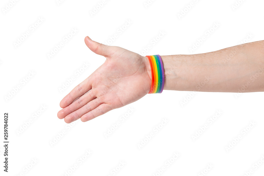 Handshake with rainbow wristband. Gay and LQBT friendly concept