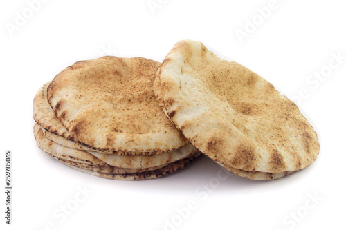 Pita bread isolated on white background. Traditional food of Arabic cuisine and culture